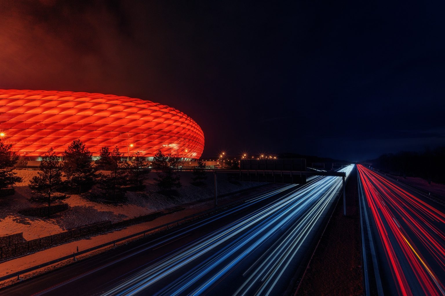 photo of a highway at night