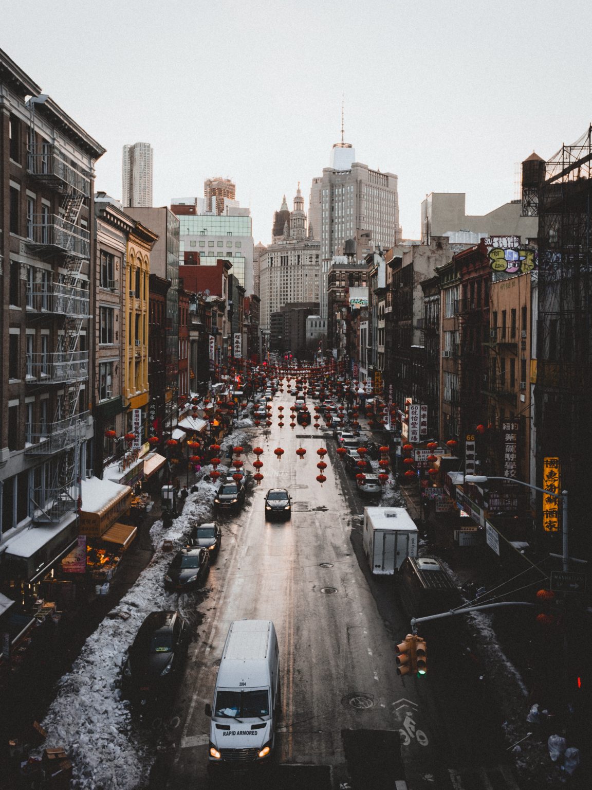 Repossession photo of red lanterns above a busy street